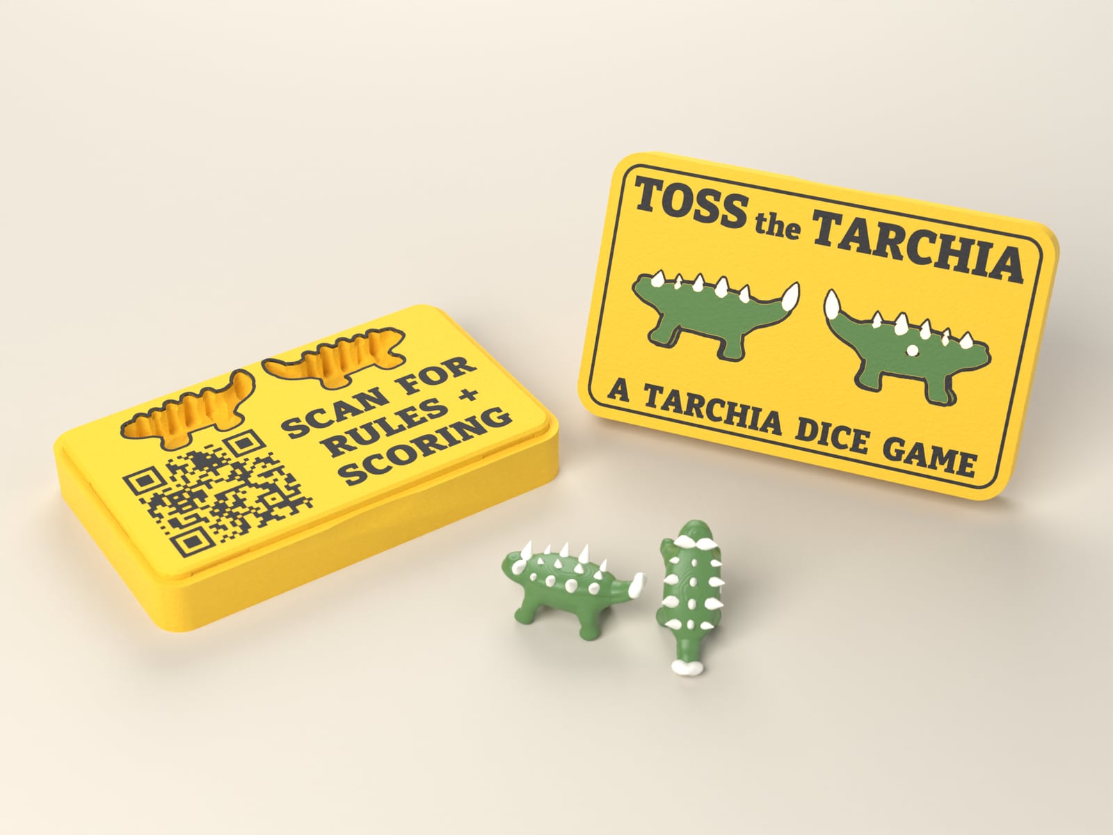 The open Toss the Tarchia case with its lid standing beside it and two tarchia dice in front